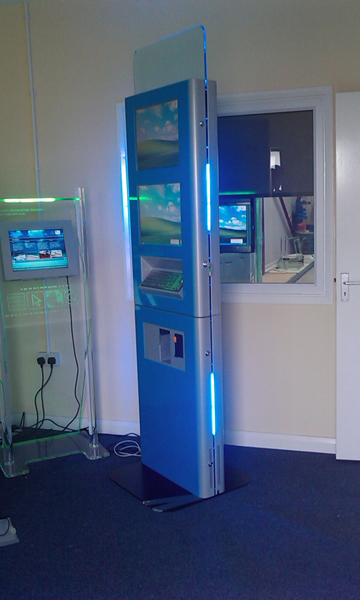 This 2 metre tall kiosk, comes with lower interactive 19'' display and a second, higher passive 19'' display for advertising purposes. At the rear of the unit a large passive of interactive third screen could replace the static advertisment area.